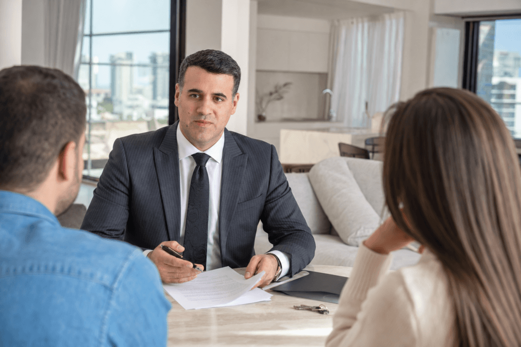 Asaf Arazi-Biton advising buyers during a second-hand apartment purchase