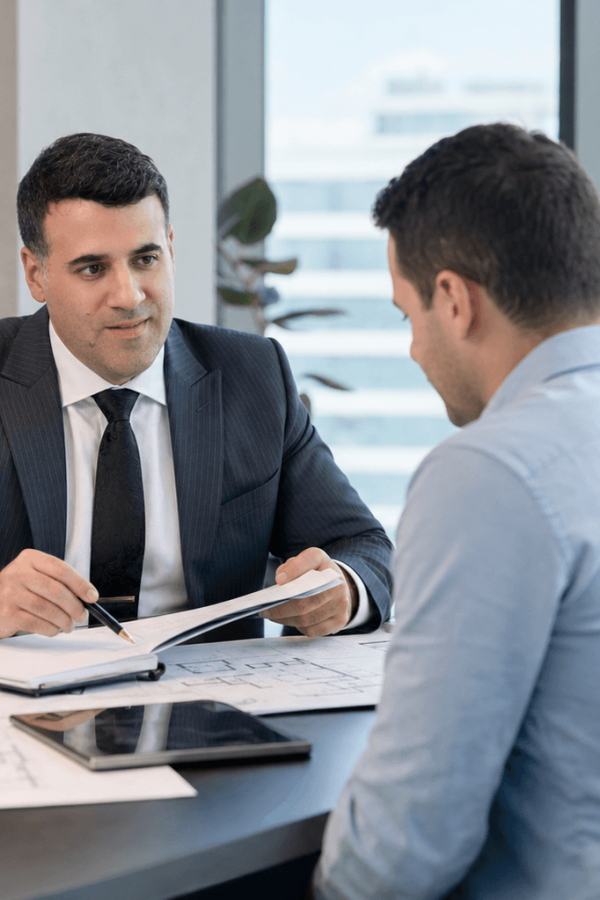 Asaf Arazi-Biton advising clients on a real estate transaction agreement